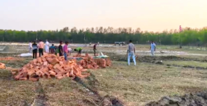 পাথরপ্রতিমায় অভিষেকের সভার আগে প্রকৃতির ভ্রুকুটি! জলমগ্ন মাঠ সারাতে নামল পাম্প ও ট্রাক ভর্তি বালি